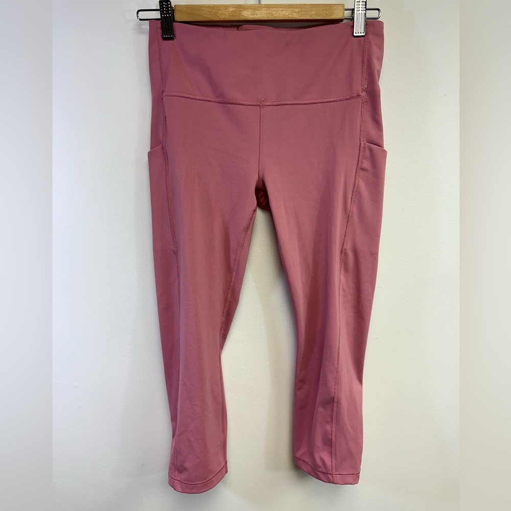 ATHLETA Ultimate Stash Pocket Capri Pink/ Berry Size Medium